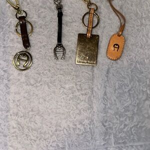 Etienne Aigner Brown and Gold bag charms/Keychains
